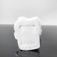 Vintage white plaster statuette of the Virgin Mary.