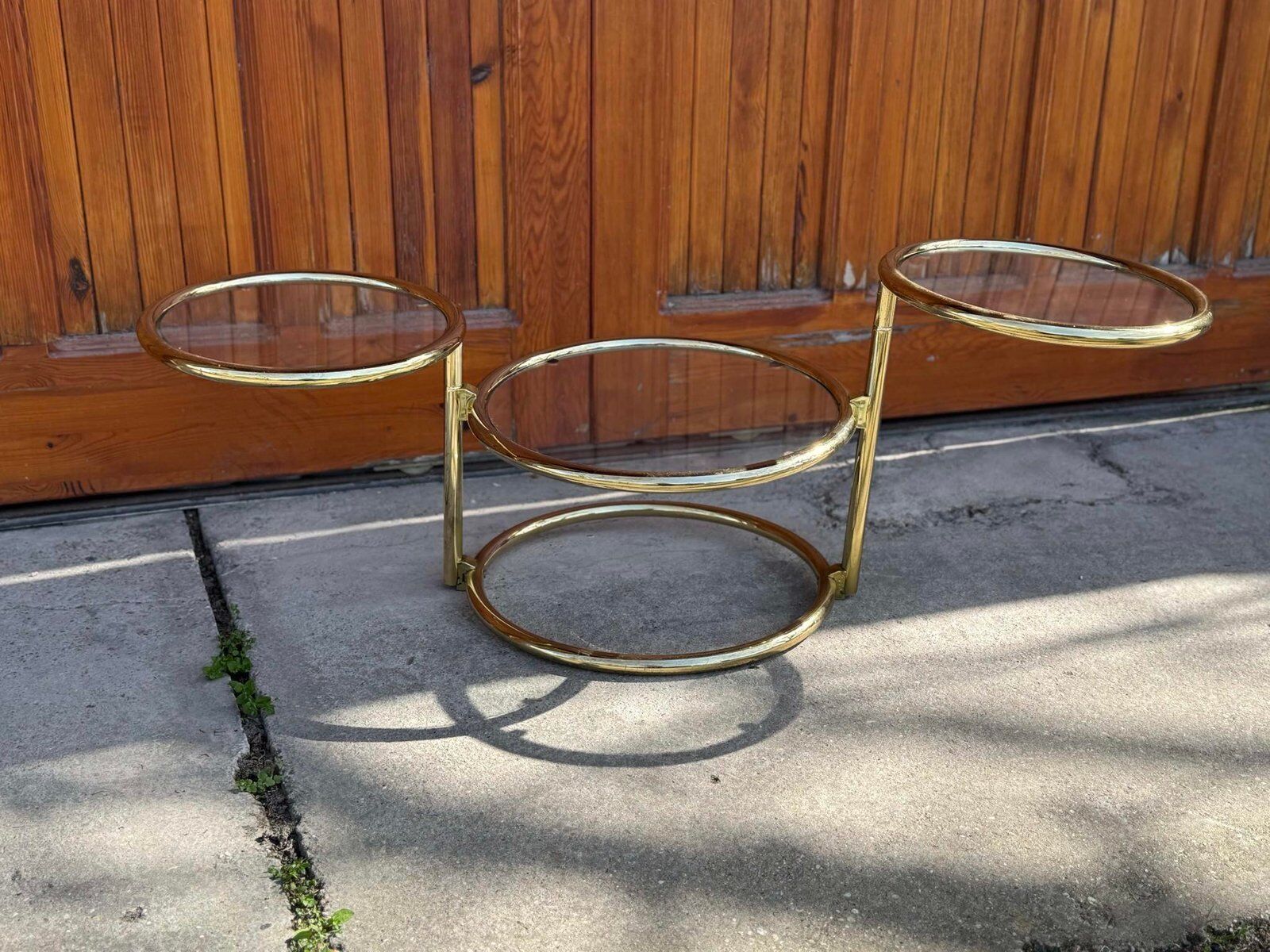 Vintage brass swivel coffee table in the style of Milo Baughman, 1970s