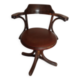 Thonet armchair, swivel, in wood and faux leather.