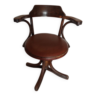 Thonet armchair, swivel, in wood and faux leather.