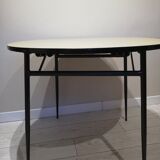 Wood-colored formica dining table