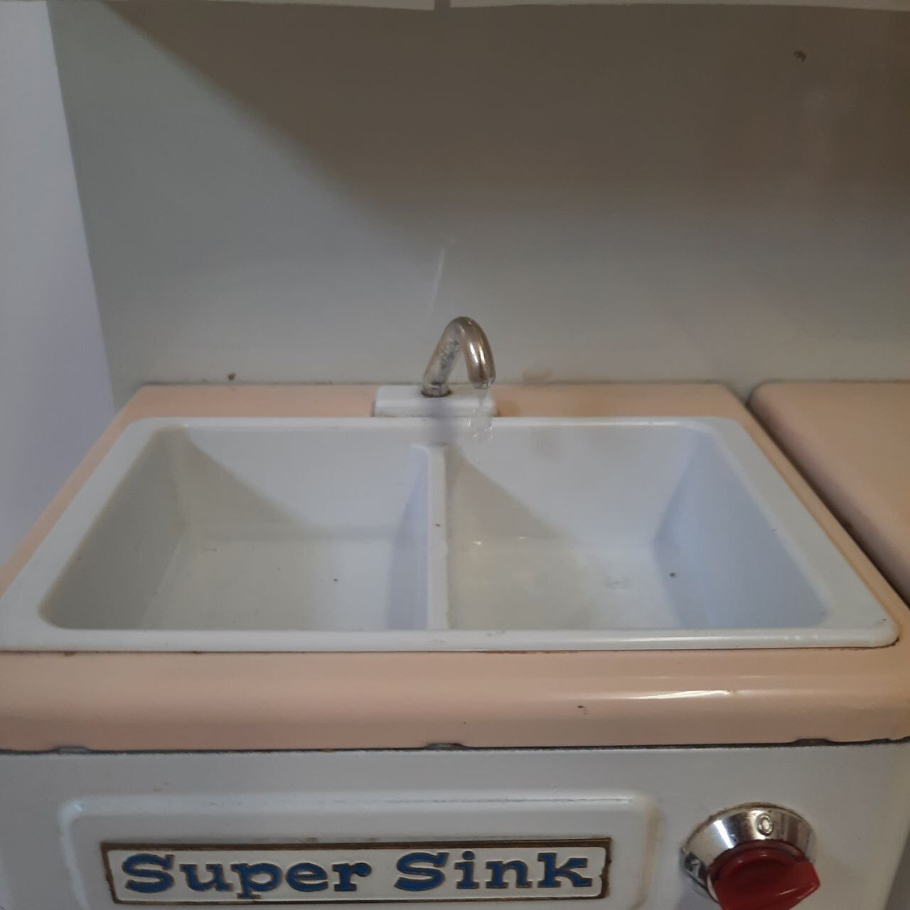 Miniature vintage toy kitchen