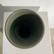 Dark green handcrafted vase with glazed ceramic grass blades