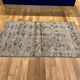 Unique aztec design muted handmade old rug