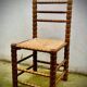 Brutalist chairs mulched in turned wood from the 60s