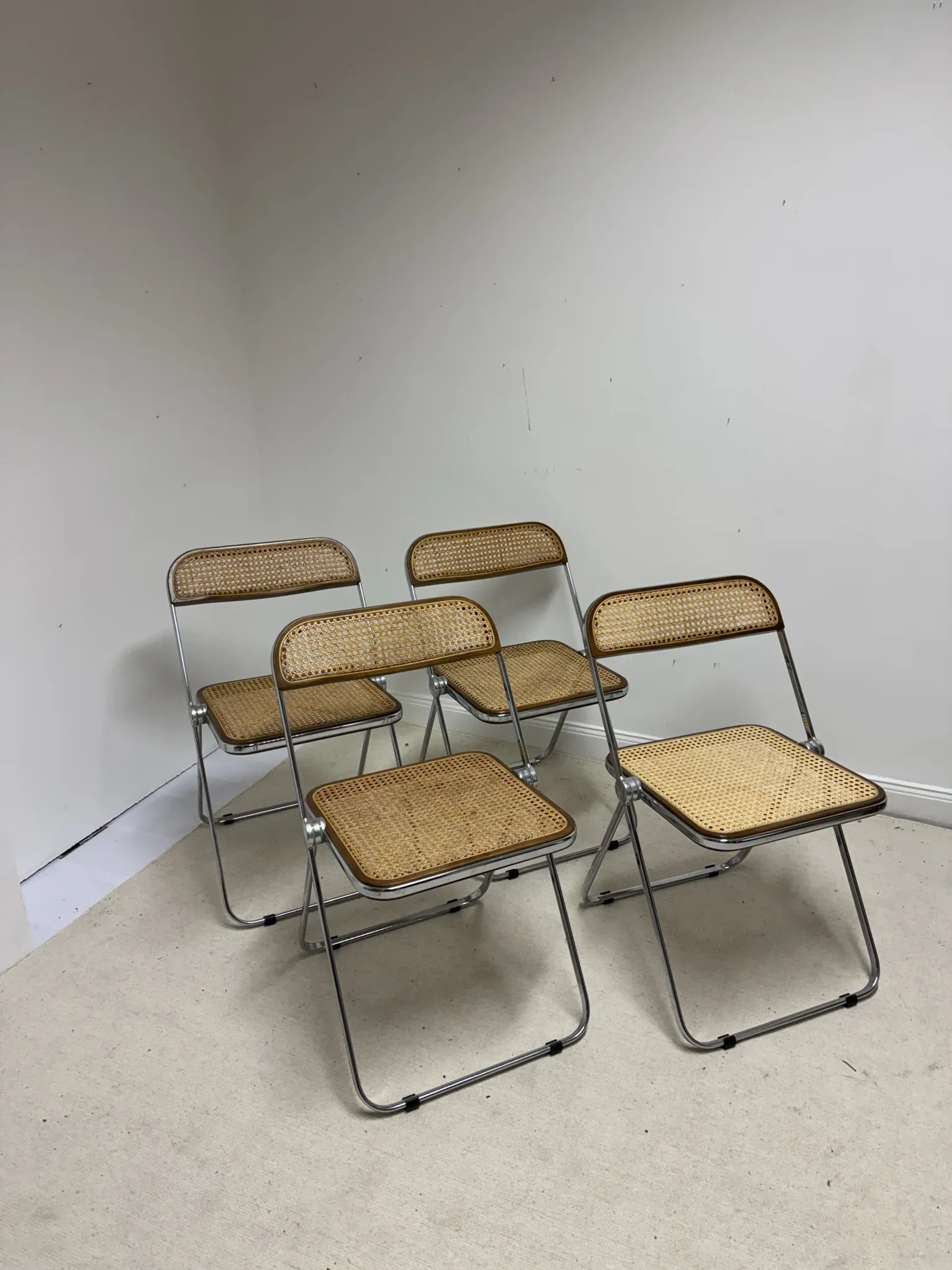 4 chaises Plia par Giancarlo Piretti