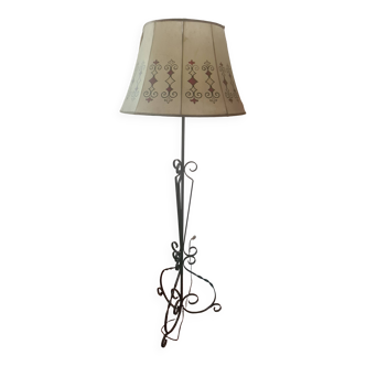 Tripod floor lamp with metal base and skin shade