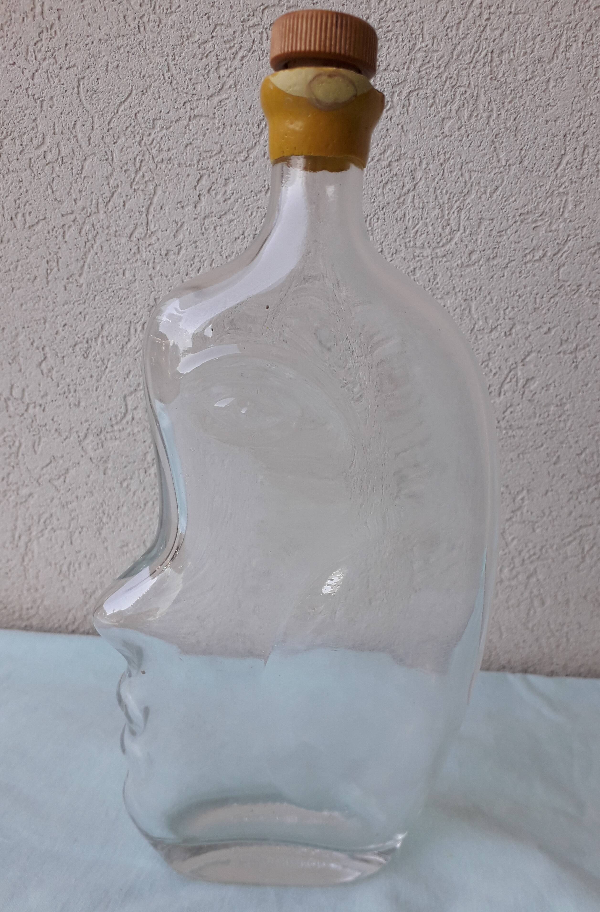 Bouteille anthropomorphe en verre