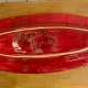 Plat en céramique rouge signé Voltz