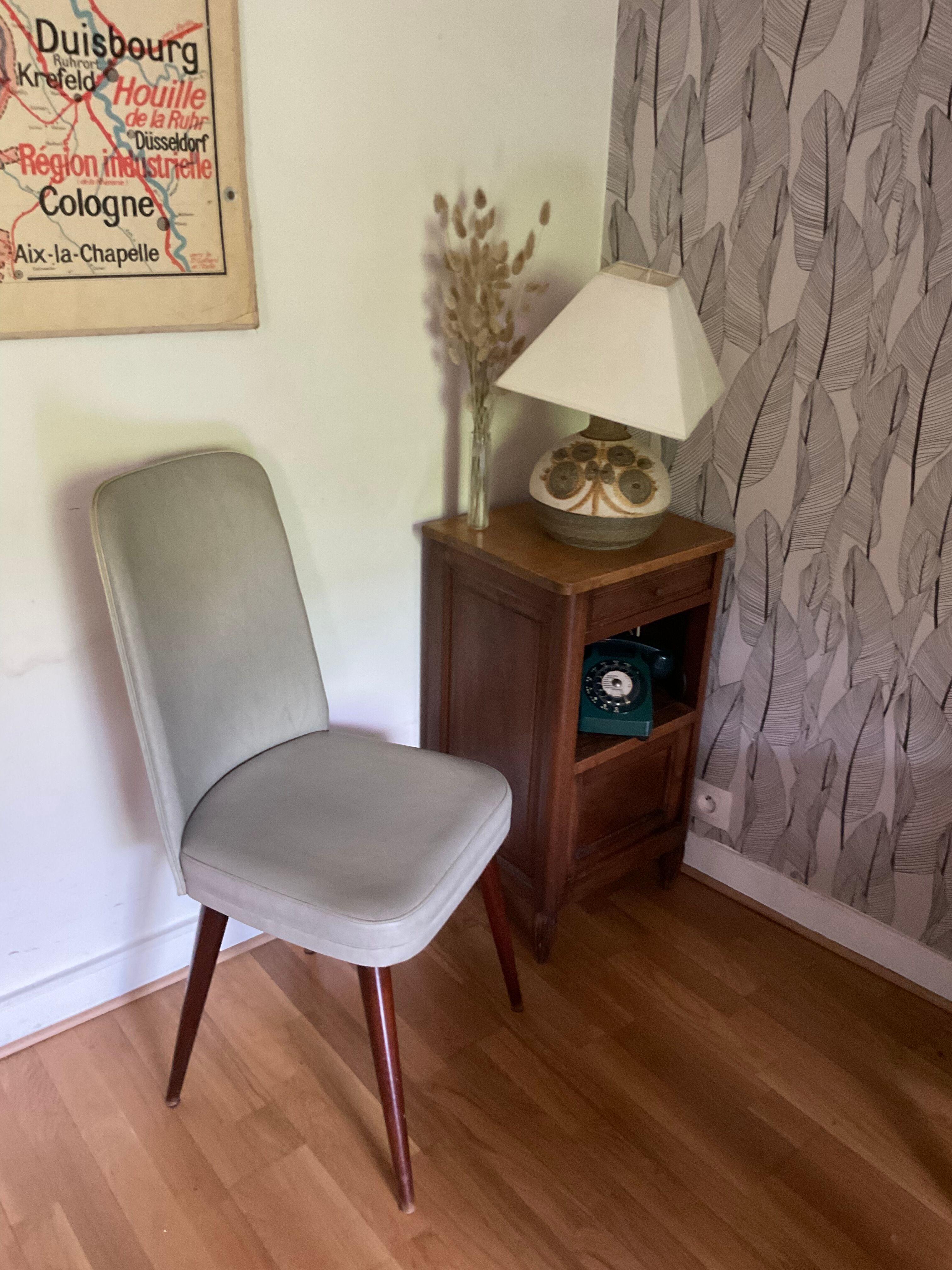 Pair of vintage mahogany and skai chairs