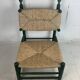 Fauteuil bas en paille de jonc français dans le style de Charles Dudouyt, années 1950