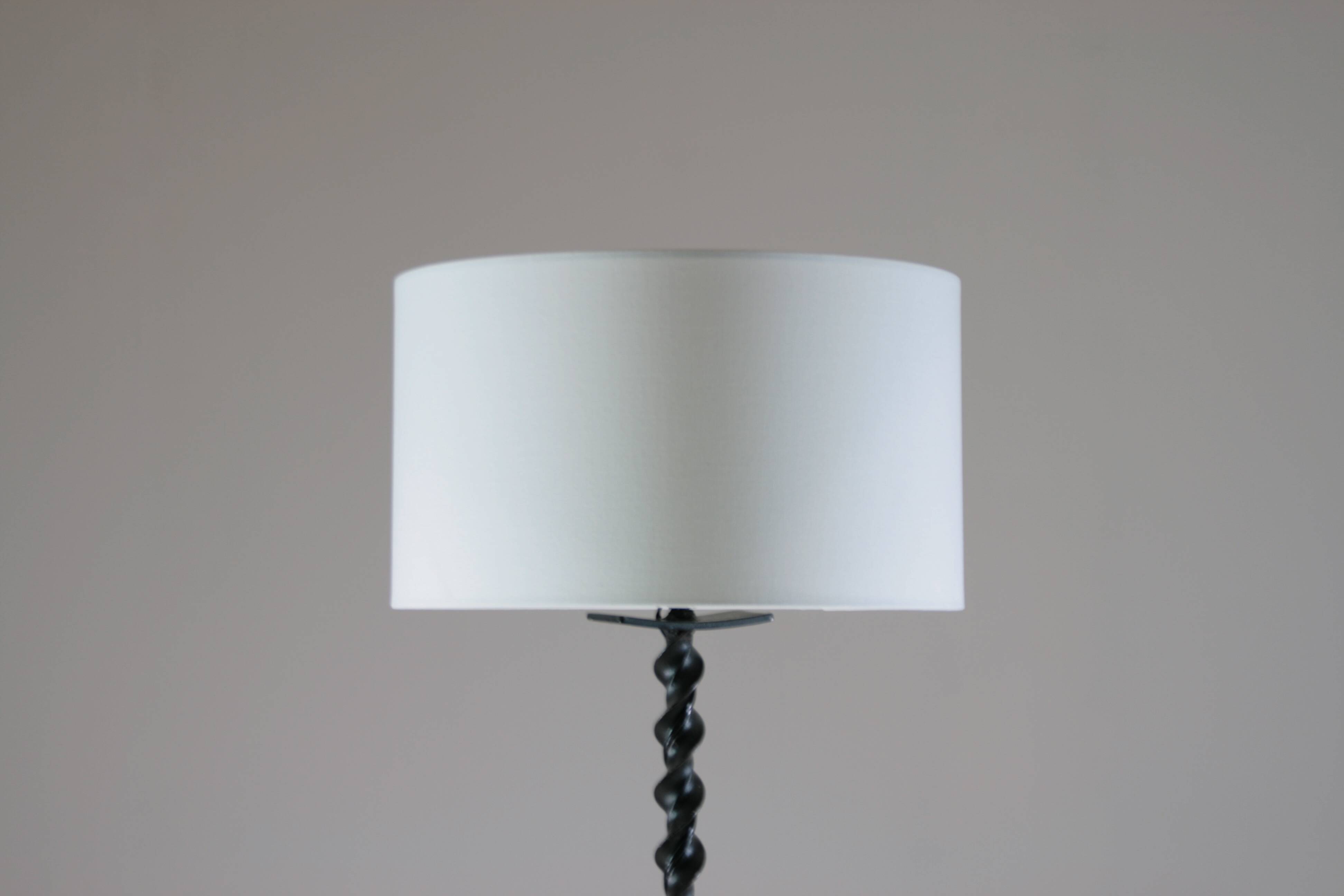 Twisted black metal brutalist floor lamp