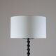 Twisted black metal brutalist floor lamp