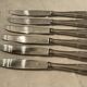 12 stainless steel knives. vintage