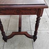 Antique desk or small table in solid carved wood