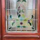 Late 19th century store doors, haberdashery front with Art Nouveau stained glass windows