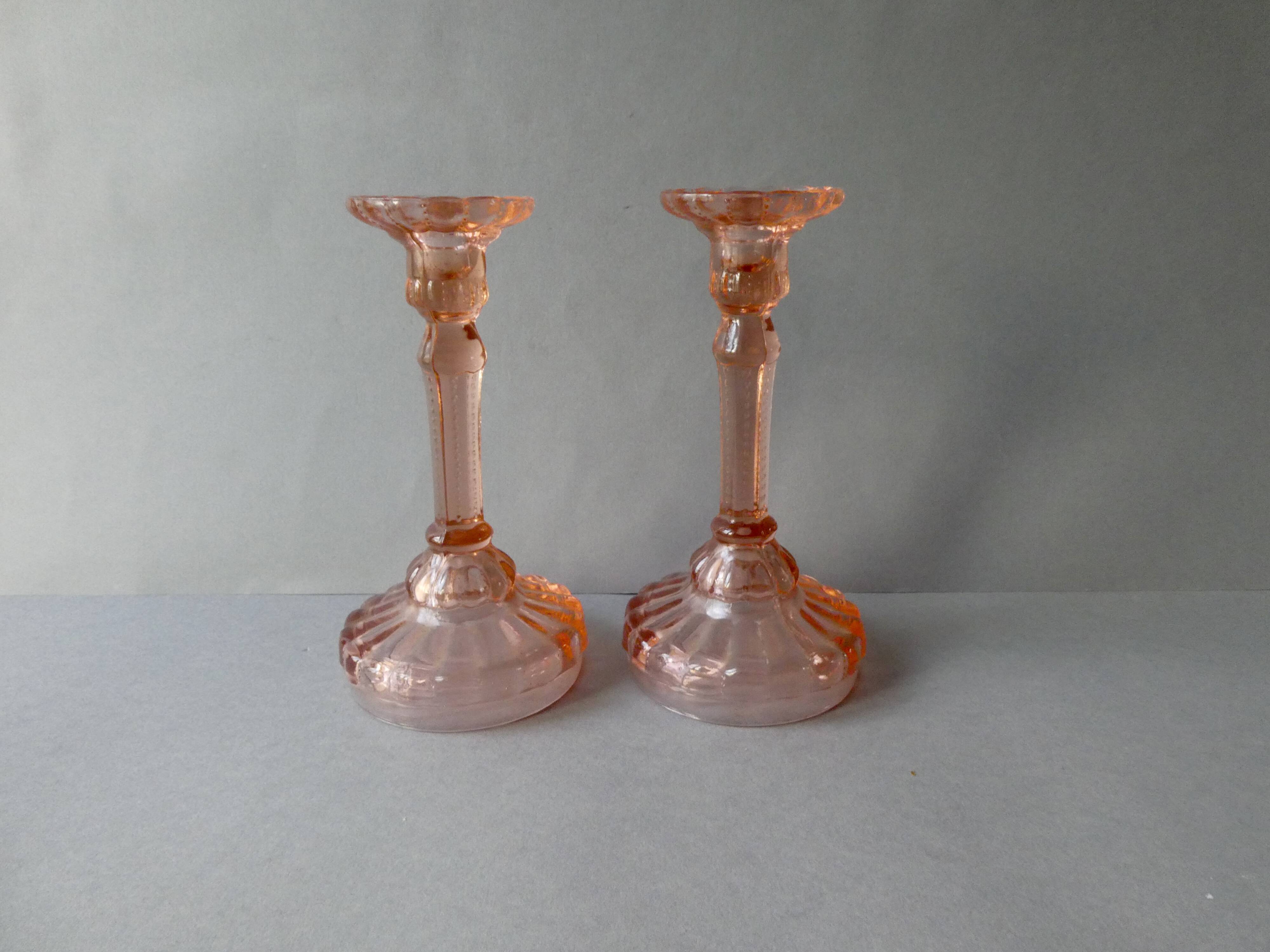 Pair of pink glass candle holders