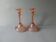 Pair of pink glass candle holders