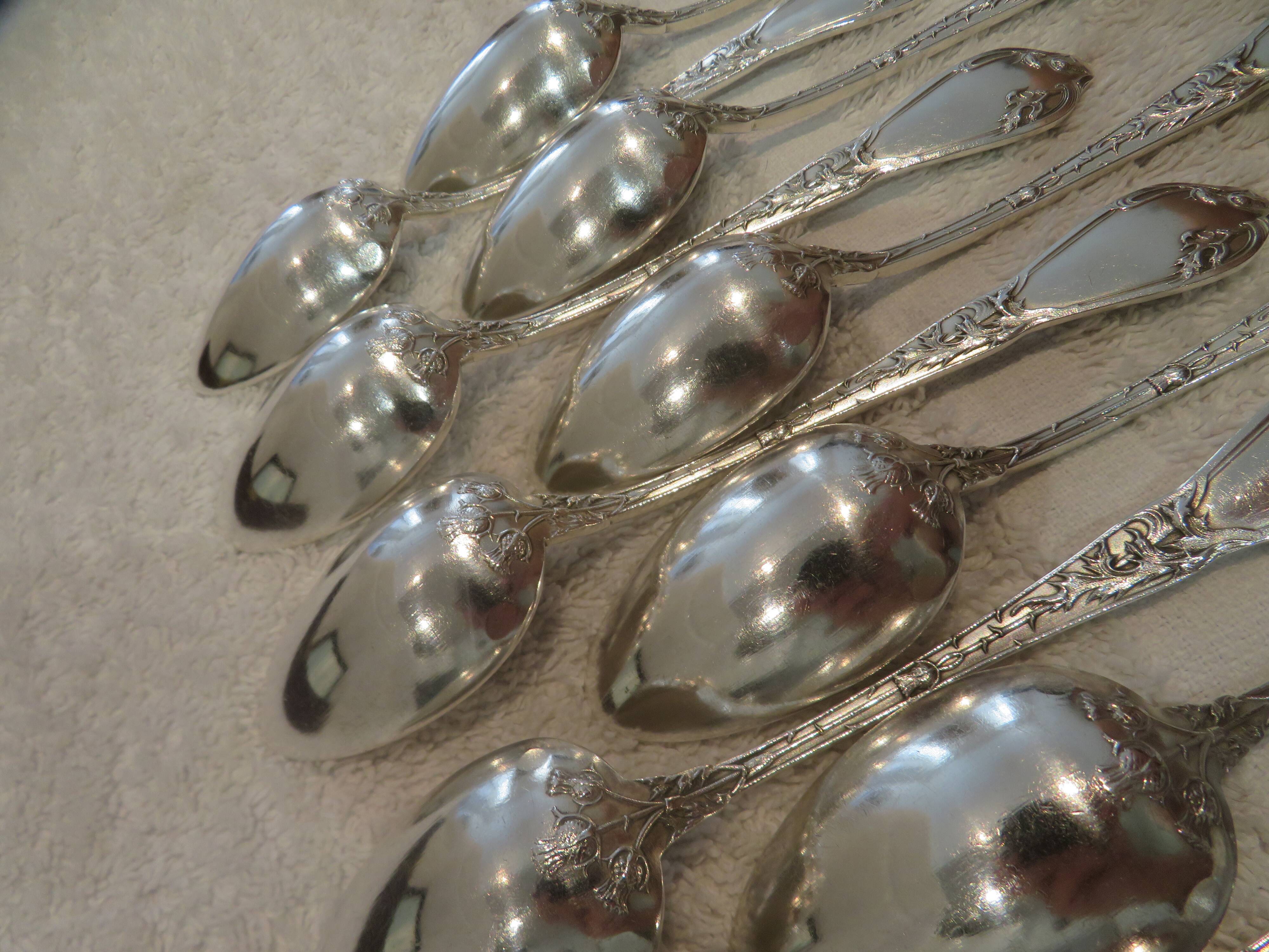12 silver-plated coffee spoons by Boulenger, Art Nouveau thistles