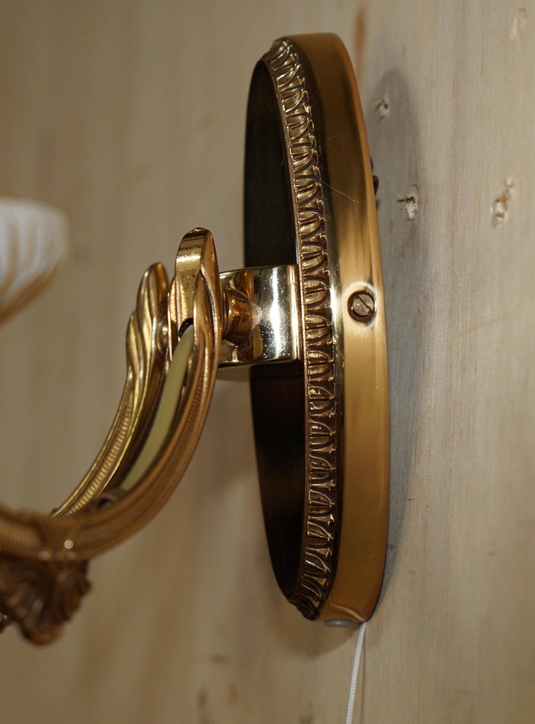 Reccagni wall light pair in brass and frosted glass.