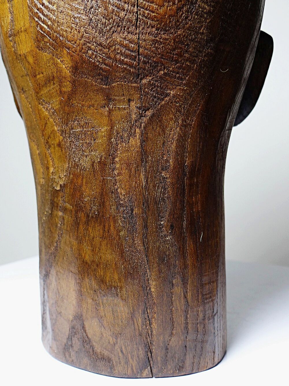 Monoxyle wood sculpture of a man's head, vintage craftsmanship from the 1950s.