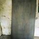 Old bistro table – cast iron legs and natural slate top
