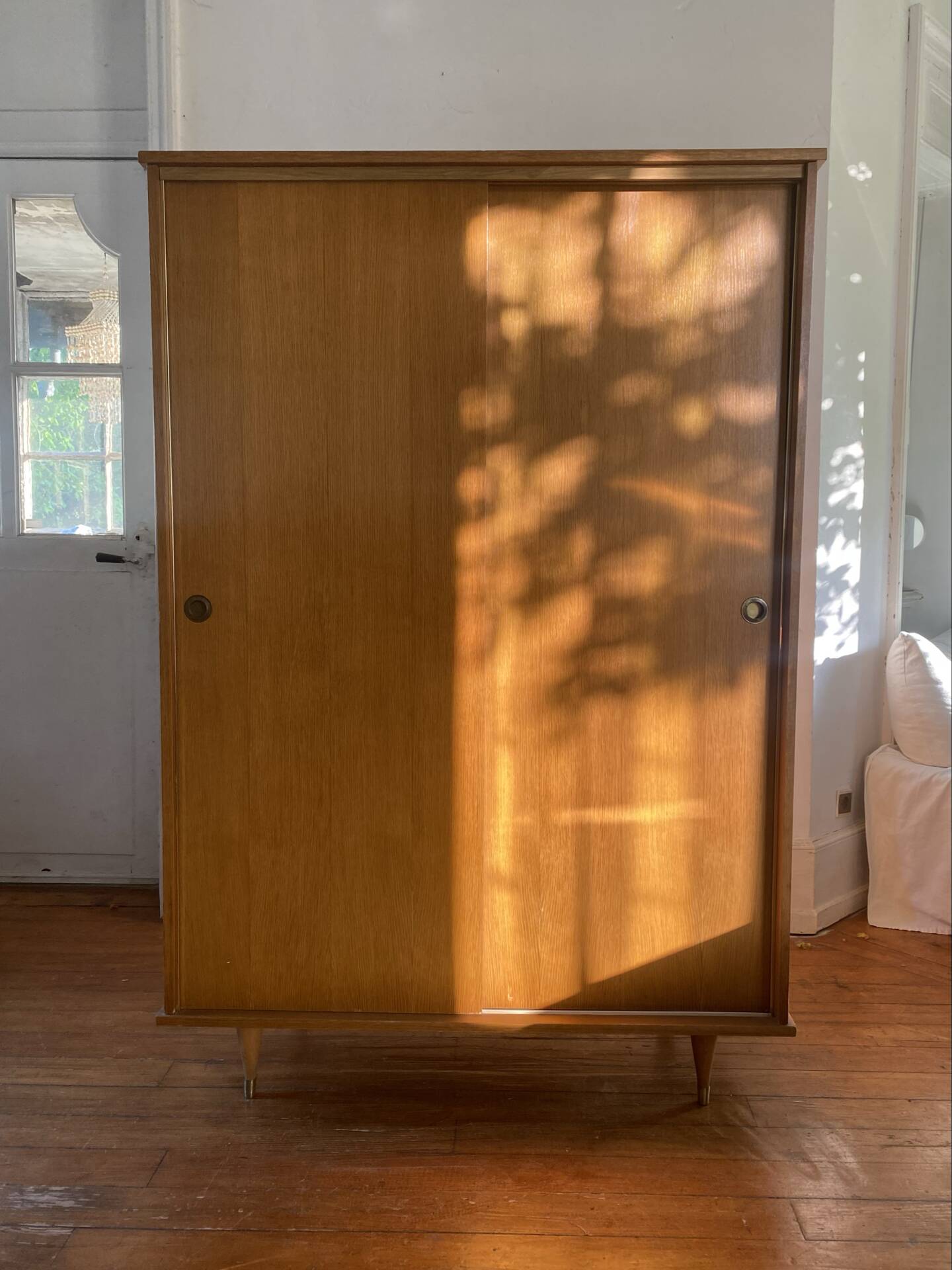Large vintage Scandinavian wardrobe with two sliding doors.