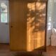 Large vintage Scandinavian wardrobe with two sliding doors.