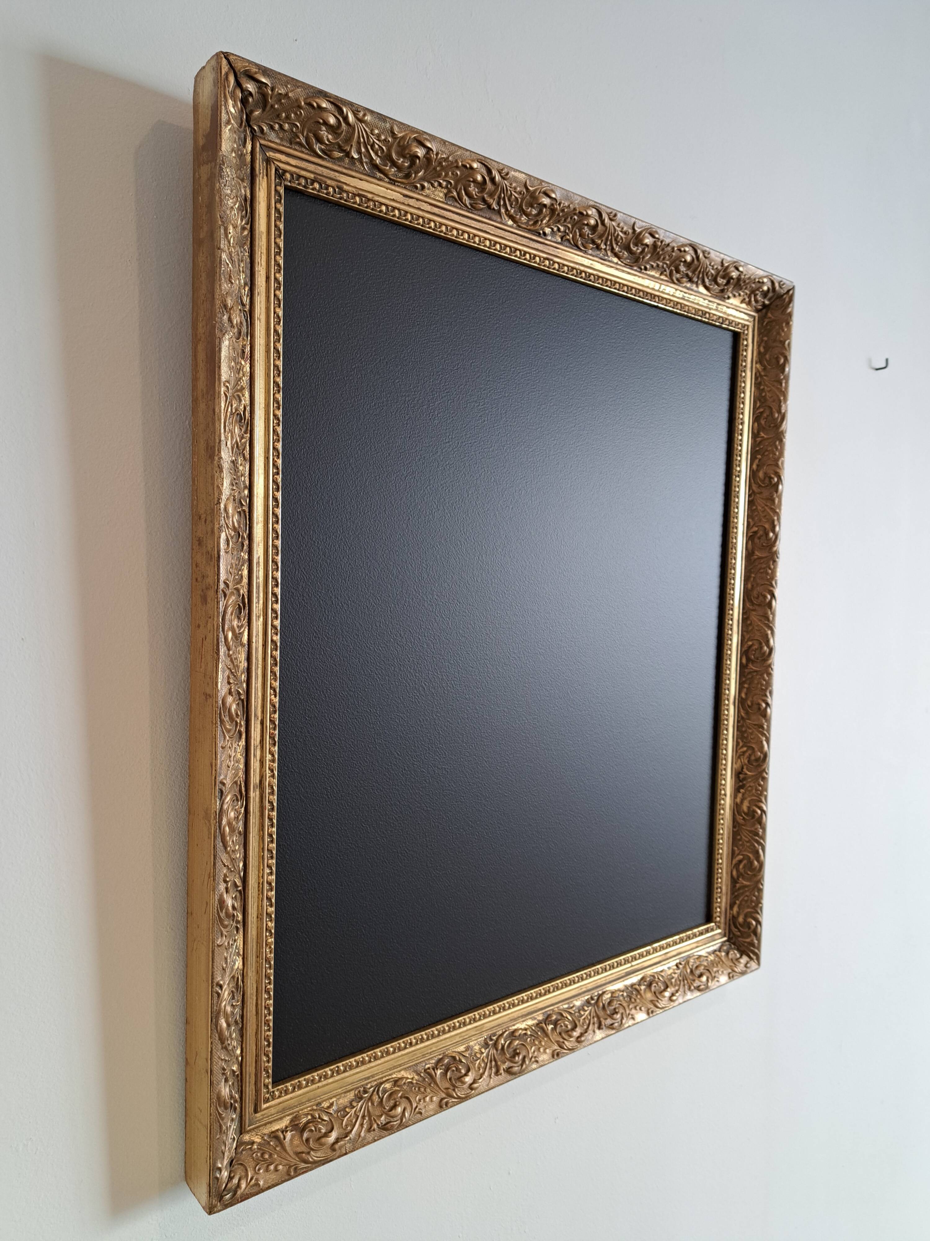 Slate table framed in gold leaf style