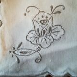 Round off-white tablecloth embroidered with grey flowers with 8 matching napkins - festive table