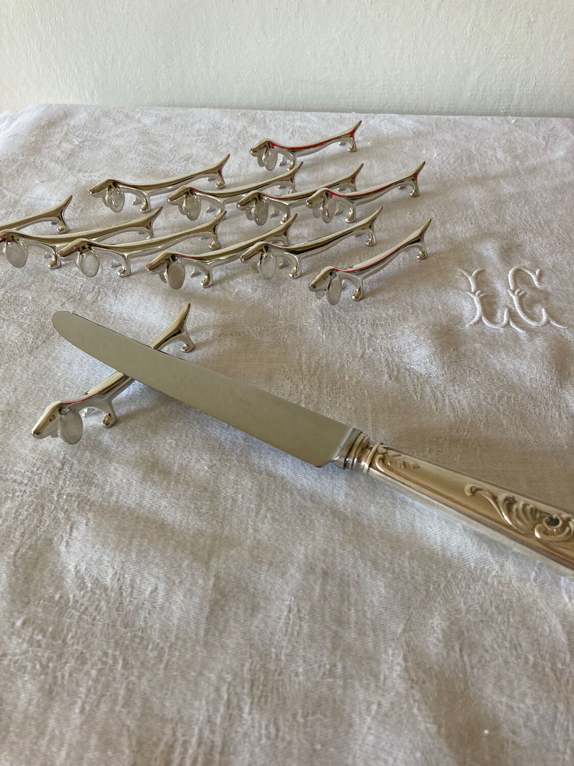 12 vintage dachshund knife holders