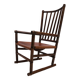 Fauteuil Manou en rotin et assise en cuir, 1960