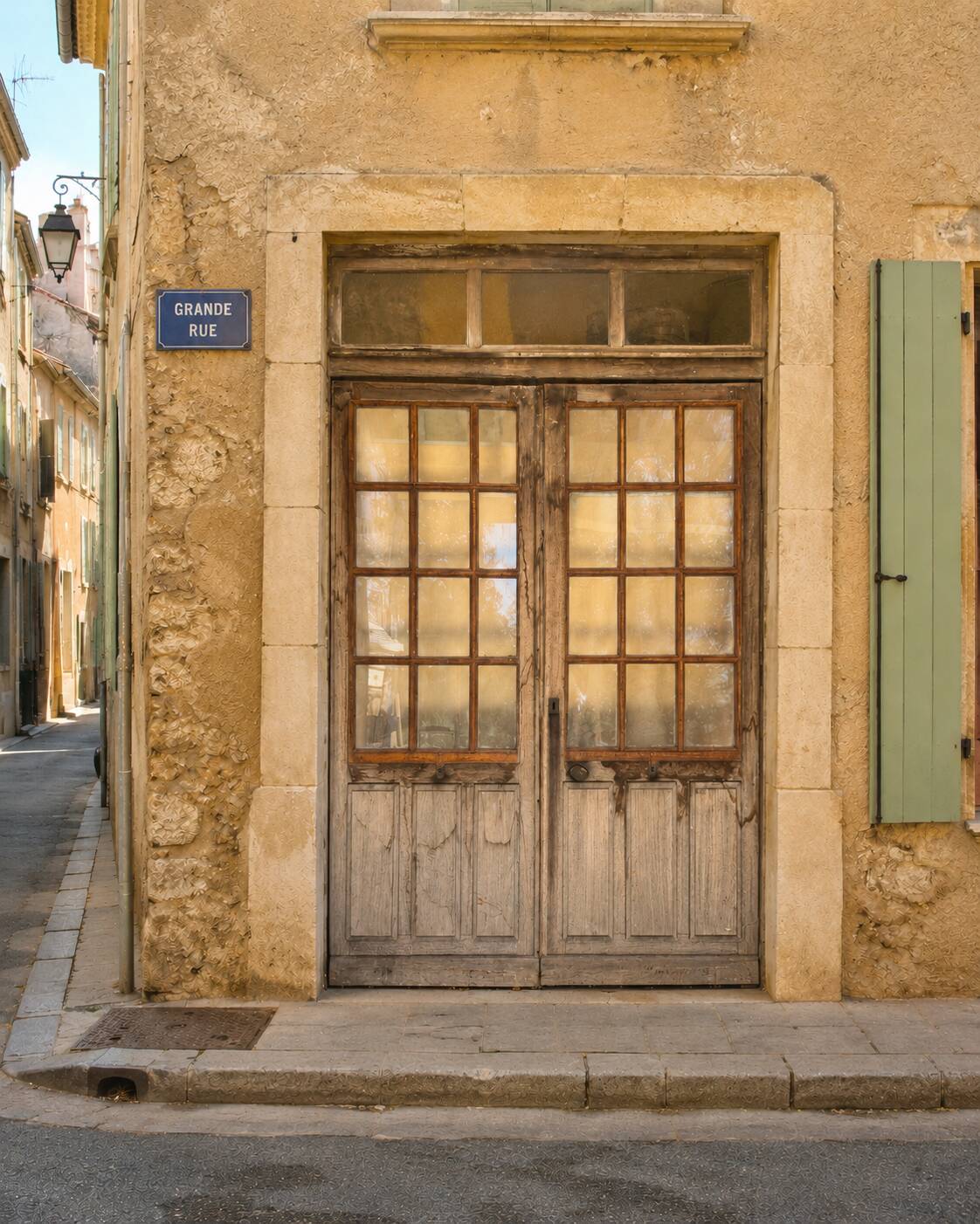 Wooden doors for an old shop front + frame