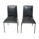 Lot de 2 chaises simili noir par Pierre Guariche