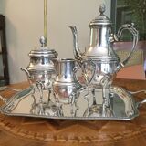 Set of a 4-piece silver metal coffee service