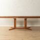 Glostrup dining table, 1980s, solid teak, by Johs. Kristoffersen & Søn, with two extension leaves