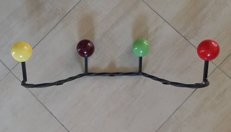 Vintage wall-mounted coat rack.