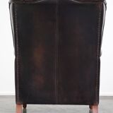 Fauteuil à oreilles en cuir de vache de style anglais avec des couleurs uniques et un excellent confort