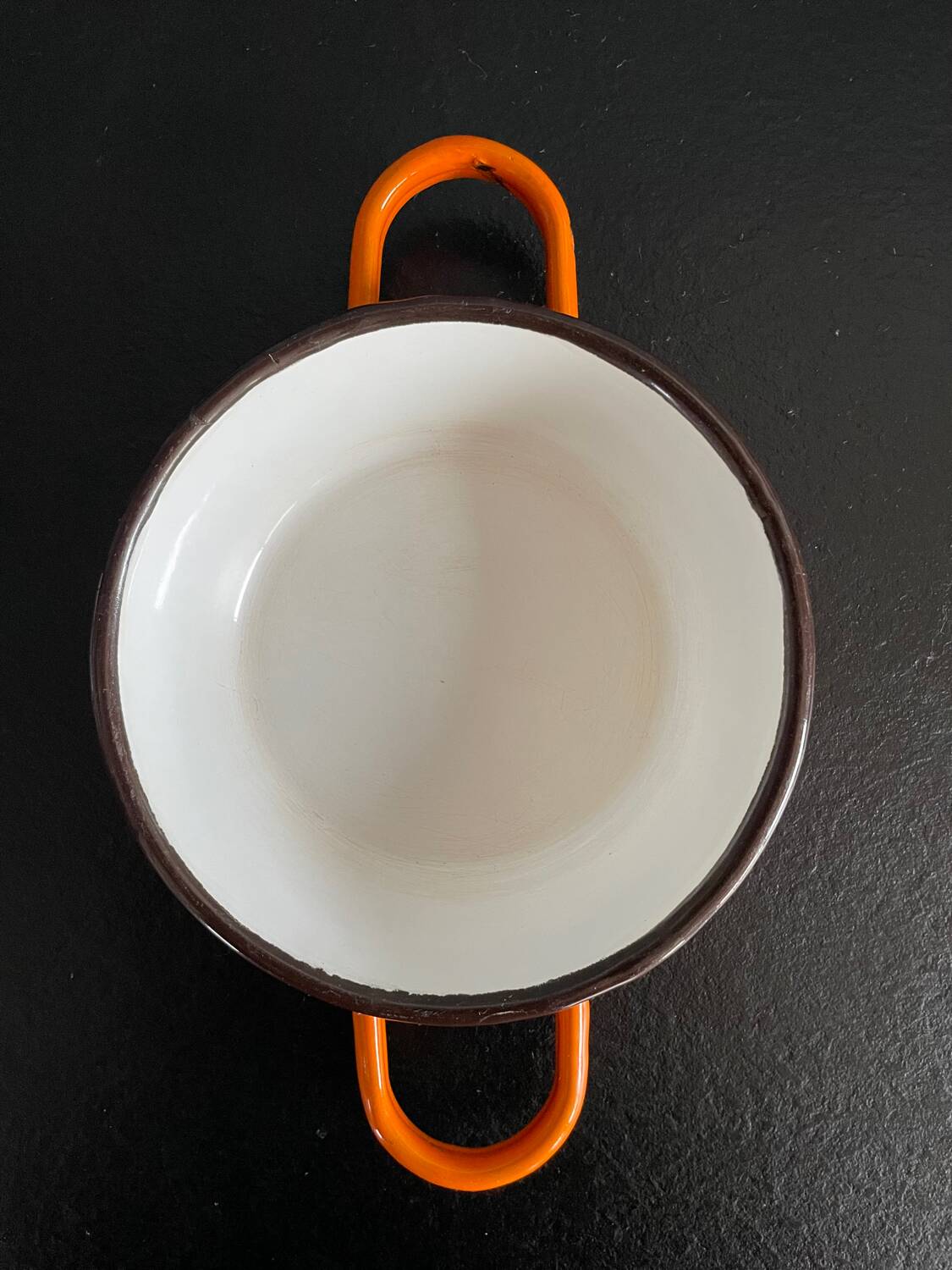 Orange enameled sheet egg dish