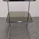 Chrome and smoked glass side table or end table, France circa 1970.