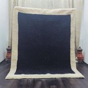 Tapis en laine noire