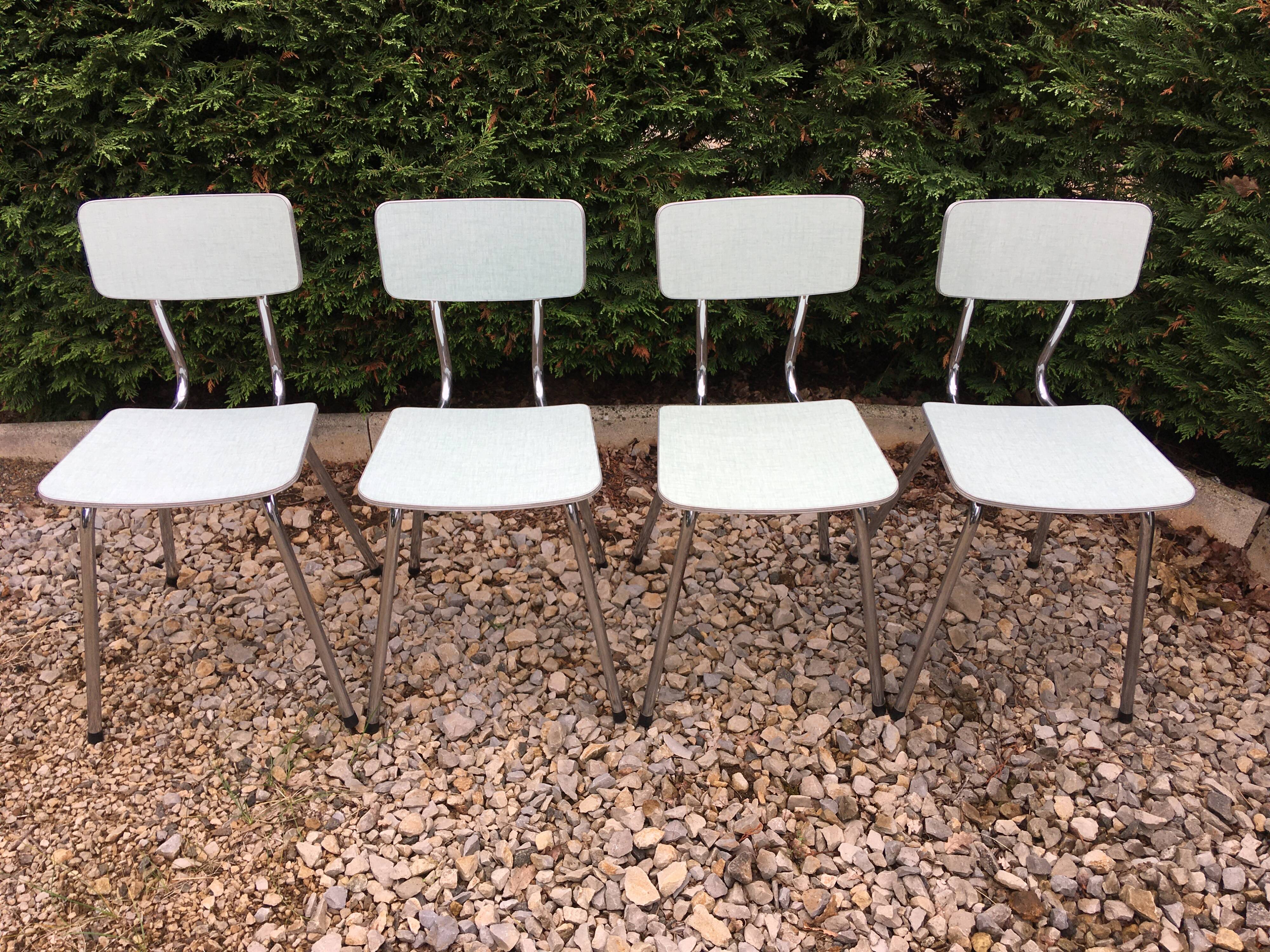 Formica table set with extensions + 4 Plastilux chairs