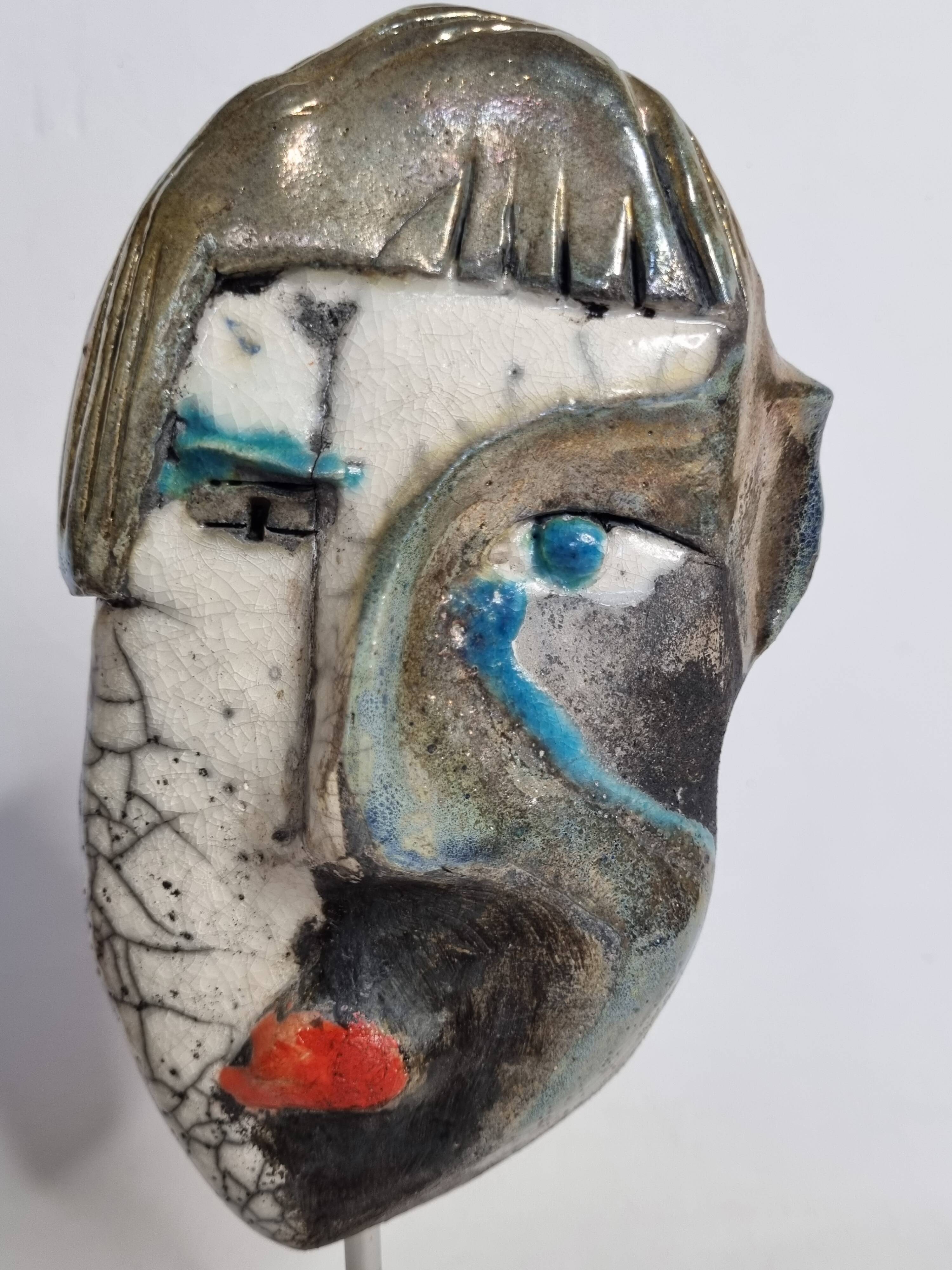 Signed raku ceramic mask on wooden base Contemporary sculpture 30 cm