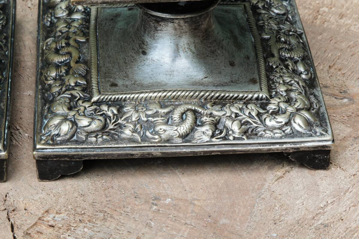 Pair of square candlesticks in patinated bronze