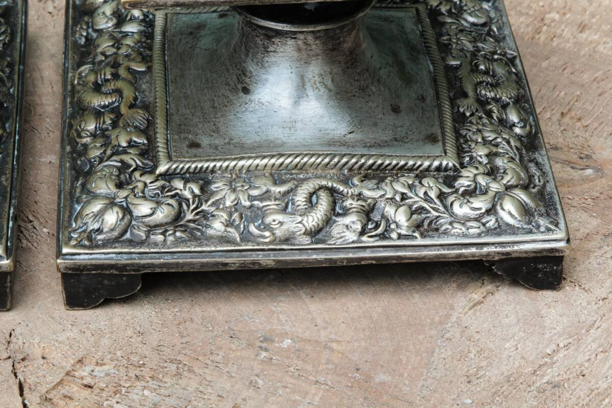 Pair of square candlesticks in patinated bronze