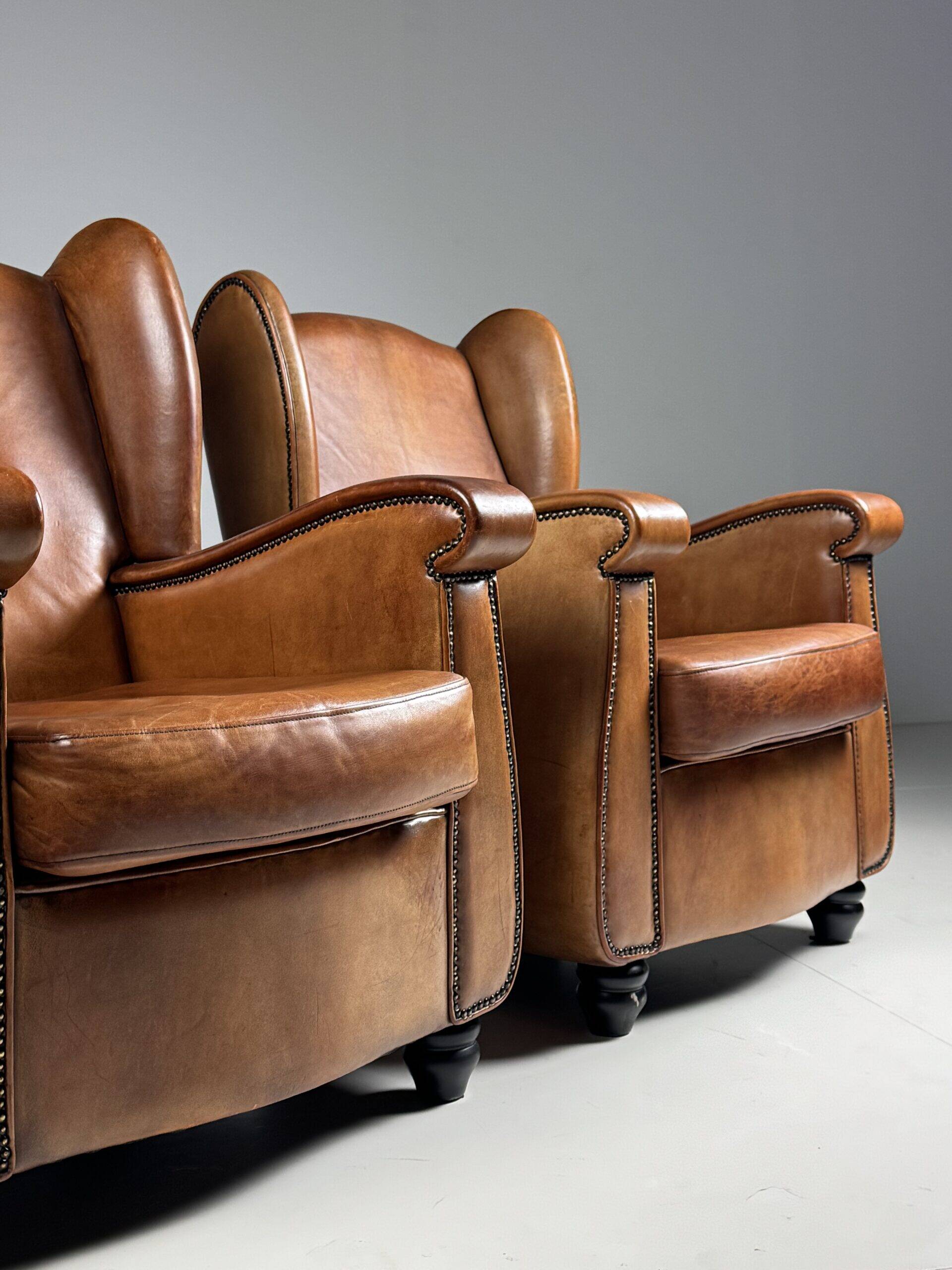 Set of 2 sheepskin club armchairs