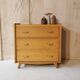 Commode pieds compas