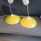 Pair of yellow lacquered metal pendant lights