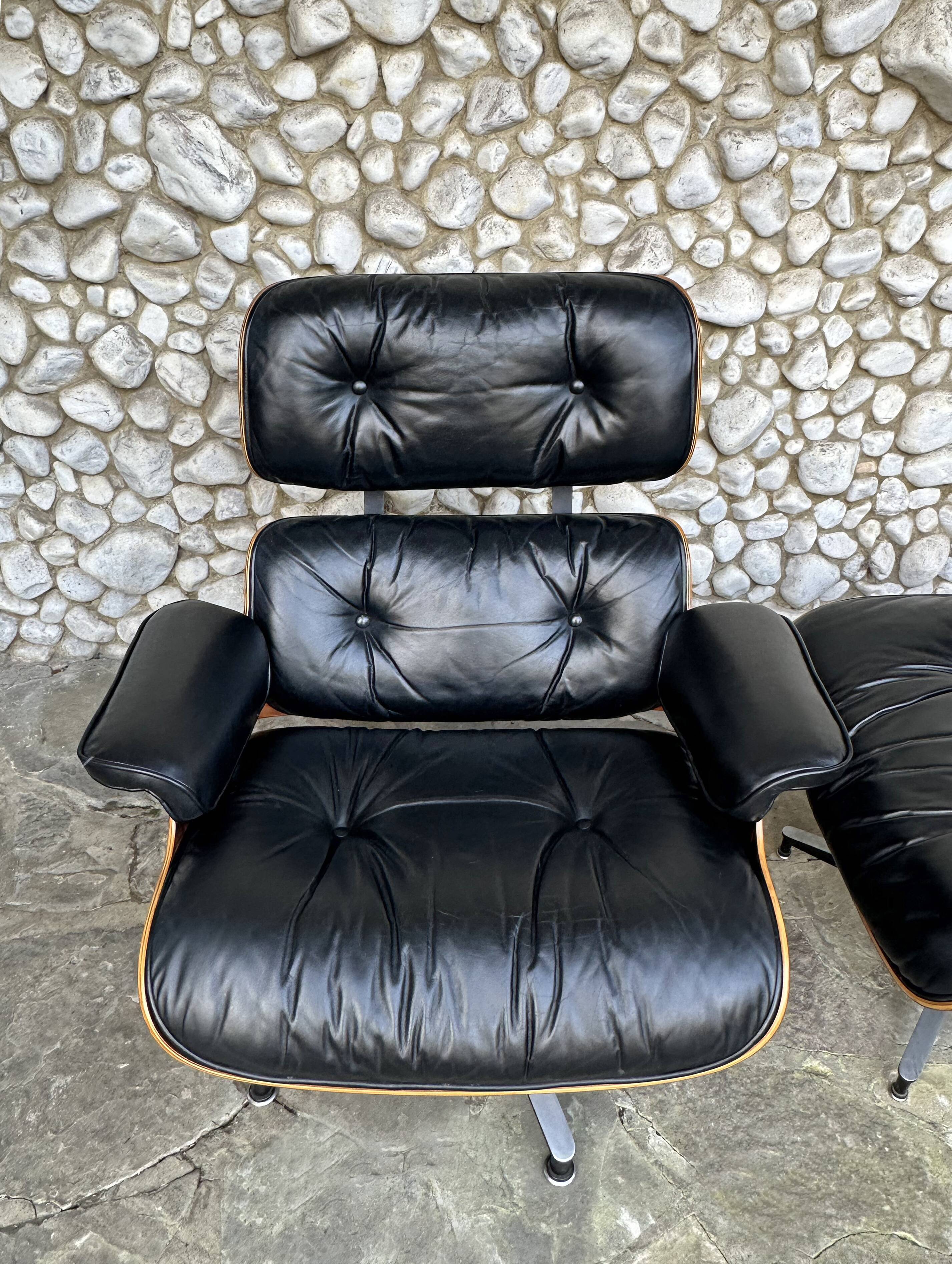Fauteuil Lounge et ottoman Herman Miller Charles & Ray Eames, palissandre