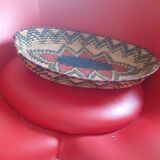 Oval basket in multi-colored straw;
